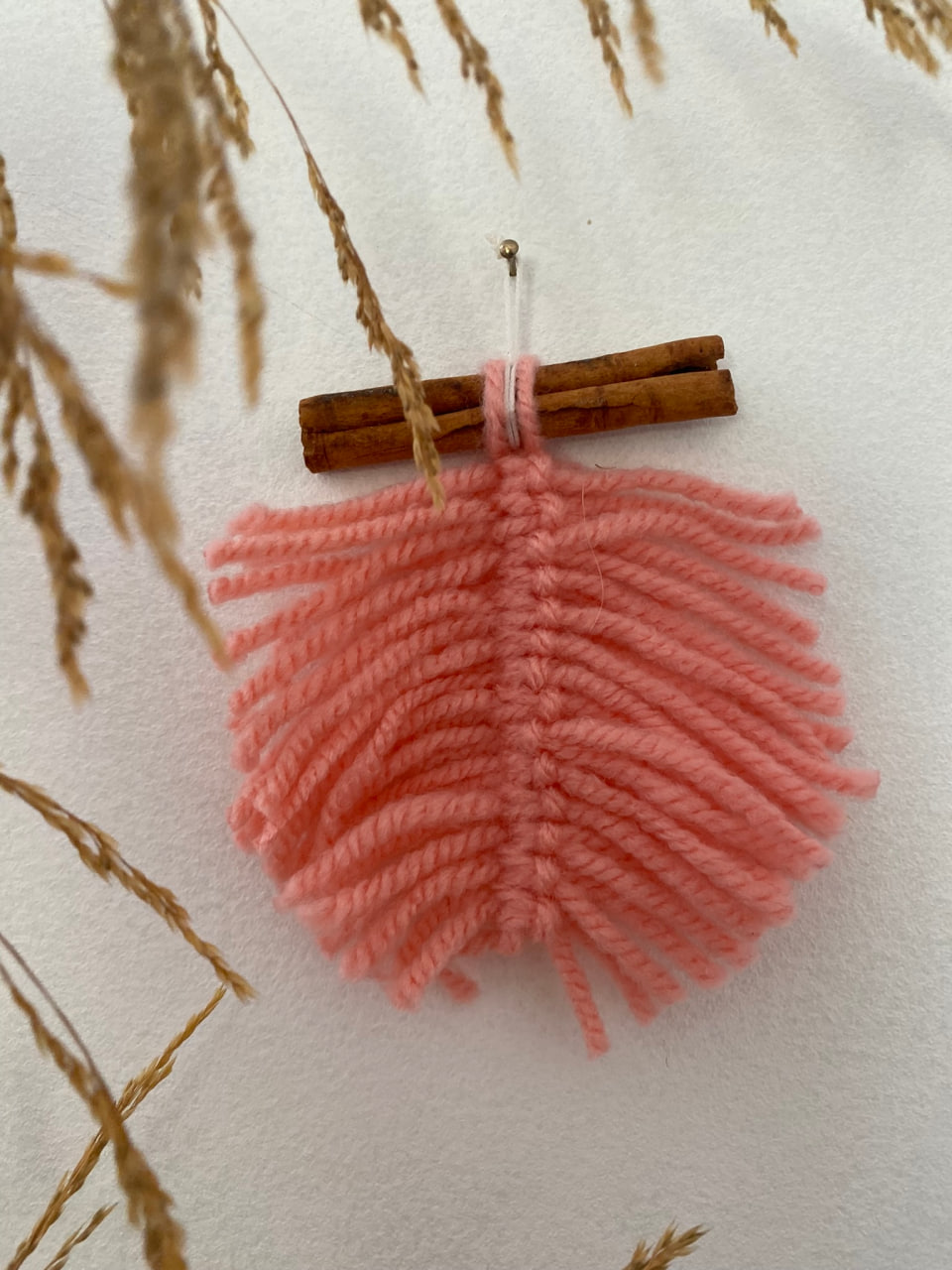 small-pink-macrame-leaf-on-cinnamon-stick-main